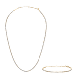 Gold-tone tennis necklace and bracelet set featuring rows of sparkling crystals, designed in a classic, elegant style for versatile everyday or special occasion wear.