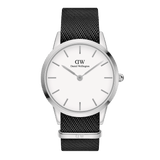Sleek watch with a polished silver case, minimalist white dial, and a textured black NATO strap crafted from recycled nylon.