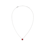 Delicate silver necklace with a domed red agate pendant and white cubic zirconia accents on a fine adjustable chain.