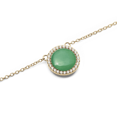 Audrey Necklace Jade Gold featuring a domed green jade pendant framed by sparkling cubic zirconia on a fine gold chain.
