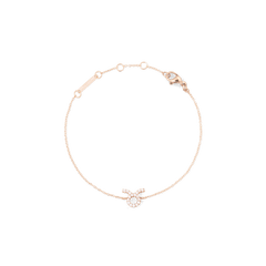 Rose gold chain bracelet featuring a delicate Taurus zodiac pendant adorned with hand-set crystals and an adjustable clasp.