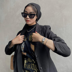 Quadro Pressed Unitone Silver ladies watch with mesh strap, styled with a black blazer, graphic tee, and silver jewellery.