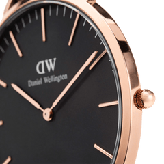 Angled close-up of the Classic Sheffield Black Rose Gold watch, showing the black dial, rose gold hands, and polished rose gold crown.