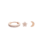 Rose gold earring set featuring a crystal-adorned hoop, a star-shaped stud with clear crystals, and a smooth crescent moon stud, all displayed against a plain background. The trio showcases a celestial theme with a refined, modern finish.