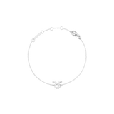 Slim silver chain bracelet featuring an adjustable fit and a Taurus zodiac charm set with sparkling cubic zirconia crystals.