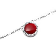 Close-up of Audrey Necklace Red Agathe Silver featuring a domed red agate pendant with cubic zirconia on a fine silver chain.