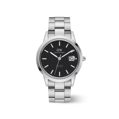Iconic Link Automatic men’s watch with a silver stainless steel bracelet, minimalist black dial, luminous markers, and a magnified date window.