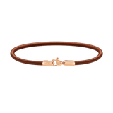 Slim brown leather bracelet with a rose gold lobster clasp and minimalist design, ideal for everyday wear.