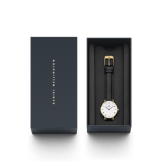 Petite Roman Numerals Sheffield Gold watch with black leather strap in Daniel Wellington gift box, elegant women’s timepiece.