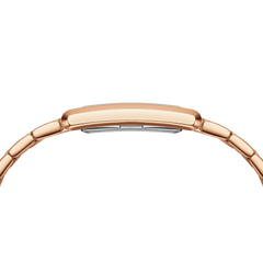 Side profile of the Bound 9-Link Emerald Sunray watch highlighting its slim rectangular rose gold case and polished 9-link bracelet.