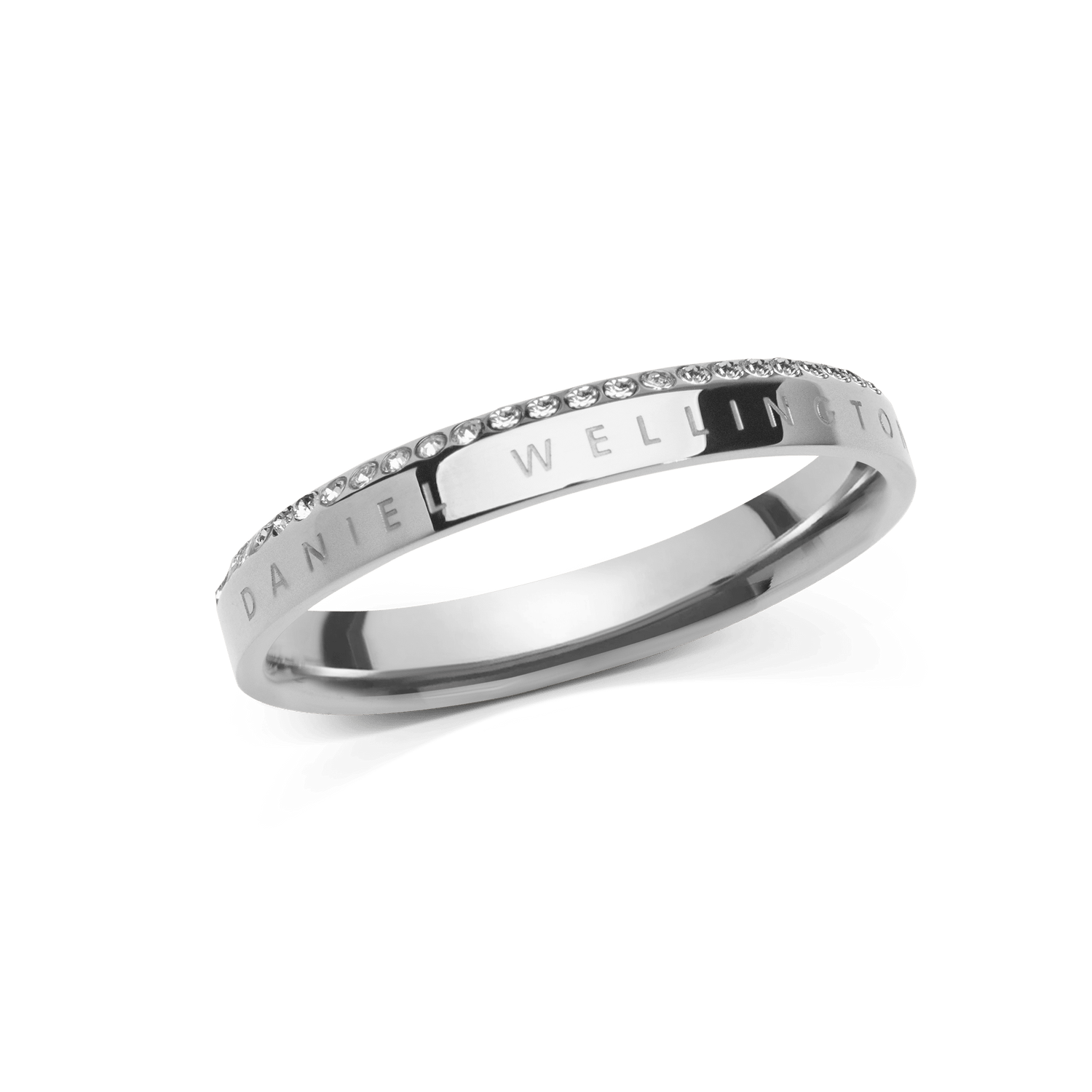 Polished silver ring crafted from 316L stainless steel, featuring a row of white cubic zirconia crystals along the chamfered edge and engraved with the Daniel Wellington name.