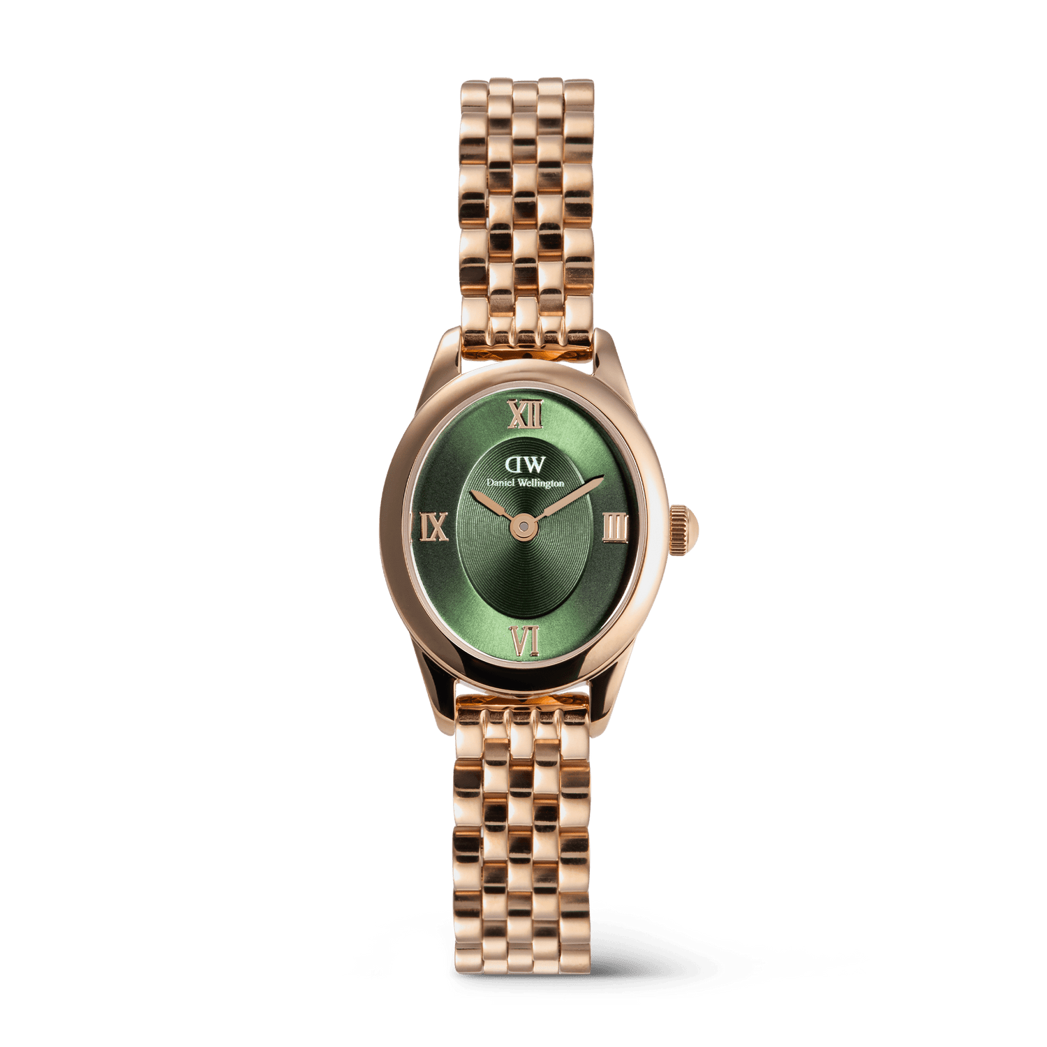 Petite rose gold women’s watch with an oval case, emerald green sunray dial, Roman numerals, and a polished beans link bracelet with butterfly clasp.