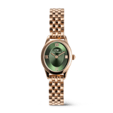 Petite rose gold women’s watch with an oval case, emerald green sunray dial, Roman numerals, and a polished beans link bracelet with butterfly clasp.