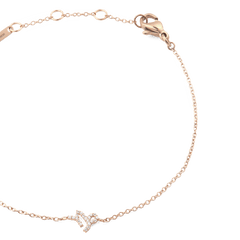 Rose gold chain bracelet with an adjustable clasp, featuring a sparkling crystal-set Capricorn zodiac pendant at the centre.