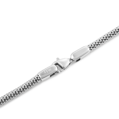 Close-up of the Tide Mesh Bracelet Sterling 2.8 showing its polished silver mesh band and secure lobster clasp engraved with the Daniel Wellington logo.