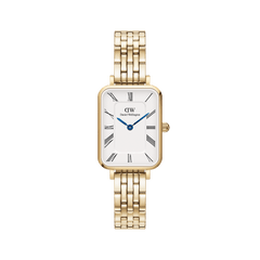Rectangular gold women’s watch with white Roman numeral dial, blue hands, and a polished 5-link bracelet by Daniel Wellington.
