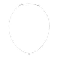 Delicate silver necklace featuring a fine chain and a star-shaped pendant adorned with white cubic zirconia crystals, designed for a subtle, elegant shimmer.
