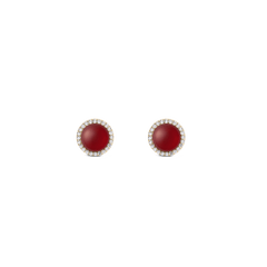 Pair of small gold stud earrings featuring domed red agate stones, each surrounded by a delicate halo of white cubic zirconia crystals. The elegant design highlights the rich red gemstone and sparkling accents, creating a refined and sophisticated look.