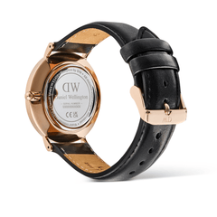 Rear view of the Classic Multi-Eye Sheffield Off-white Sunray Rose Gold watch, showing the engraved Daniel Wellington case back, rose gold detailing, and adjustable black leather strap with a rose gold pin buckle.