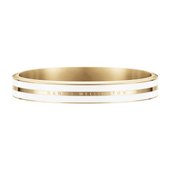 Satin white and gold Emalie Infinite bangle with a sleek enamel inlay and engraved Daniel Wellington logo, offering a refined and modern look.