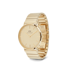 Classic Piano Link Gold Unitone watch with a brushed gold dial, minimalist markers, and a geometric gold piano link bracelet in a three-quarter view.