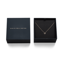Mirelle Heart Necklace Rose Gold displayed in an elegant Daniel Wellington gift box, featuring a delicate rose gold chain and a heart-shaped pendant with sparkling white cubic zirconia crystals.