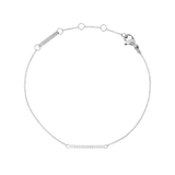 Slim silver bracelet featuring a delicate chain and a curved bar set with sparkling white cubic zirconia crystals, finished with an adjustable clasp for a refined, minimalist look.