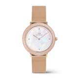 Rose gold women’s watch with a shimmering mother of pearl dial, sparkling crystal-set bezel, and a refined mesh strap, showcasing elegant and sophisticated design.