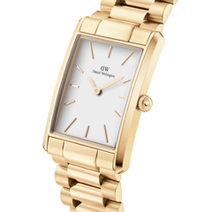 Bound 3-Link Gold women’s watch featuring a rectangular gold case, white minimalist dial, and polished three-link gold bracelet.