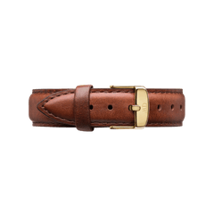 Brown St Mawes leather watch strap with fine stitching and a gold-tone engraved buckle, offering a classic and versatile accessory for Daniel Wellington watches.