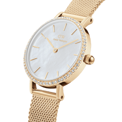 Petite gold mesh women’s watch with crystal-set bezel and iridescent mother of pearl dial by Daniel Wellington.