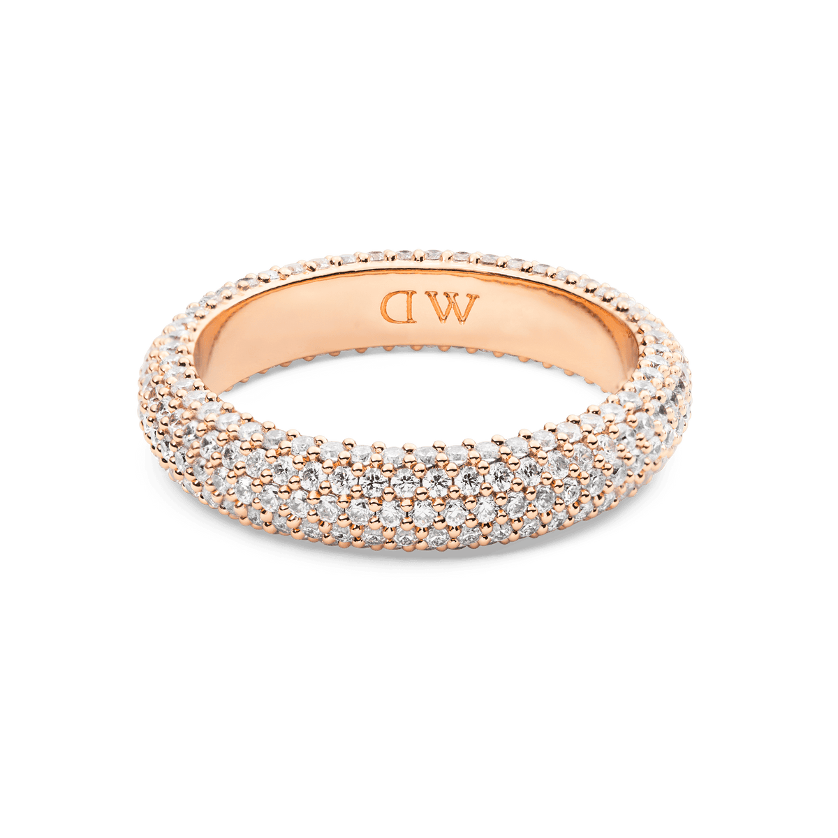 Rose gold pavé ring with a 5 mm band, set with rows of sparkling white cubic zirconia crystals and finished with subtle DW branding inside the band.