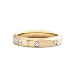 Classic Lumine Ring Gold 4 mm featuring a polished gold band with three evenly spaced cubic zirconia stones, crafted from stainless steel with PVD gold plating for a refined, minimalist finish.