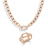 Rose gold chain necklace and matching ring, both featuring bold links with a central crystal-embellished detail for a refined, modern look. The set highlights contemporary design with a touch of sparkle, perfect for elevating everyday or special occasion style.