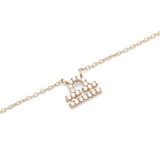 Gold chain necklace featuring a Libra zodiac pendant adorned with sparkling hand-set crystals.