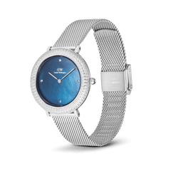 Crystalline Bezel Sterling Blue ladies watch with blue mother-of-pearl dial, crystal-set bezel, and silver mesh strap.