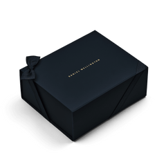 Premium navy blue gift box with a subtle ribbon bow and gold Daniel Wellington branding, featuring a sleek, sturdy design ideal for presenting jewellery, watches, or keepsakes.