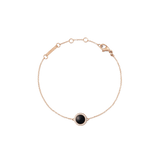 Rose gold bracelet with a black agate centrepiece, surrounded by white crystals on a delicate adjustable chain.