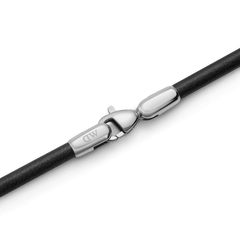 Close-up of the Sheffield Bracelet Silver showing the engraved polished stainless steel lobster clasp attached to the slim black leather band.