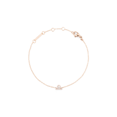 Rose gold chain bracelet featuring a sparkling Libra zodiac pendant with hand-set crystals and adjustable sizing rings.