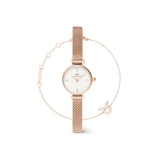 Petite rose gold watch with a slim mesh strap and minimalist white dial, paired with a delicate rose gold chain bracelet featuring a sparkling zodiac charm.