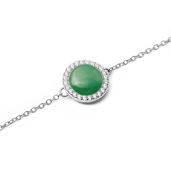 Close-up of Audrey Bracelet Jade Silver featuring a domed green jade charm with a halo of sparkling cubic zirconia crystals.