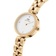 Elan Lumine Gold women’s watch with gold-tone bracelet, white crystal-set dial, and minimalist gold hands by Daniel Wellington.