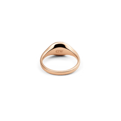 Classic Mini Signet Ring Rose Gold shown from the inside, highlighting the engraved DW logo on the polished rose gold-plated stainless steel band.