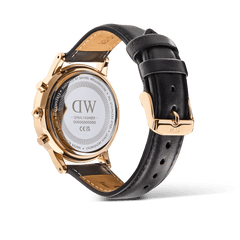 Rear view of the Iconic Chronograph Sheffield Arctic Panda Rose Gold watch by Daniel Wellington, showing the engraved stainless steel case back, rose gold detailing, and adjustable black leather strap with a matching rose gold buckle.