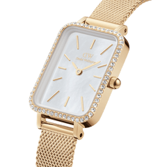 Quadro Lumine Bezel Evergold MOP watch featuring a rectangular gold case with a mother-of-pearl dial, crystal-set bezel, and a gold mesh strap.