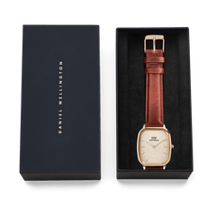 Marlon St Mawes Linen Rose Gold watch with brown leather strap in Daniel Wellington gift box, perfect for gifting.
