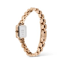 Rear view of the Quadro Mini Arch 3-link White Sunray Rose Gold watch, highlighting the engraved stainless steel case back and polished rose gold-plated bracelet with butterfly clasp.