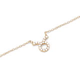 Close-up of the Crystal Zodiac Chain Necklace Gold, showcasing a Taurus zodiac pendant set with sparkling hand-set crystals on a fine gold-plated chain.