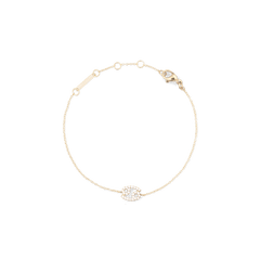 Delicate gold chain bracelet featuring a crystal-encrusted zodiac pendant with adjustable sizing rings and a secure lobster clasp.